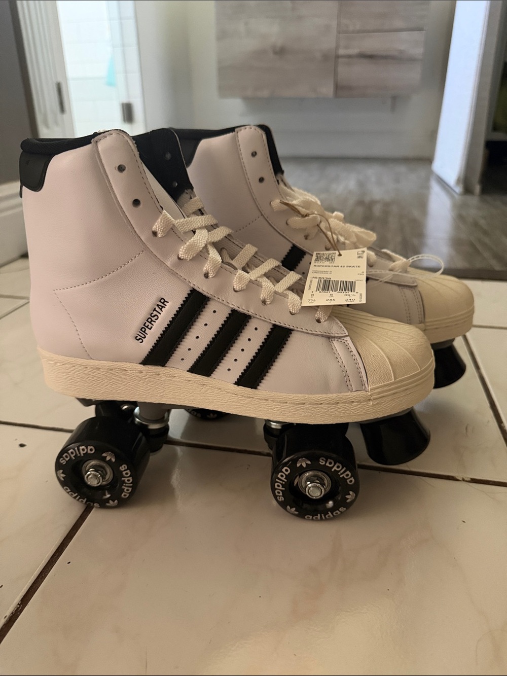adidas adults White High-Top Roller Skates with Black Stripes